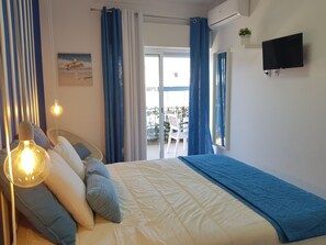 1 slaapkamer, een strijkplank/strijkijzer, gratis wifi, beddengoed