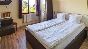 Economy Double Room | 1 bedroom, iron/ironing board, free WiFi, bed sheets