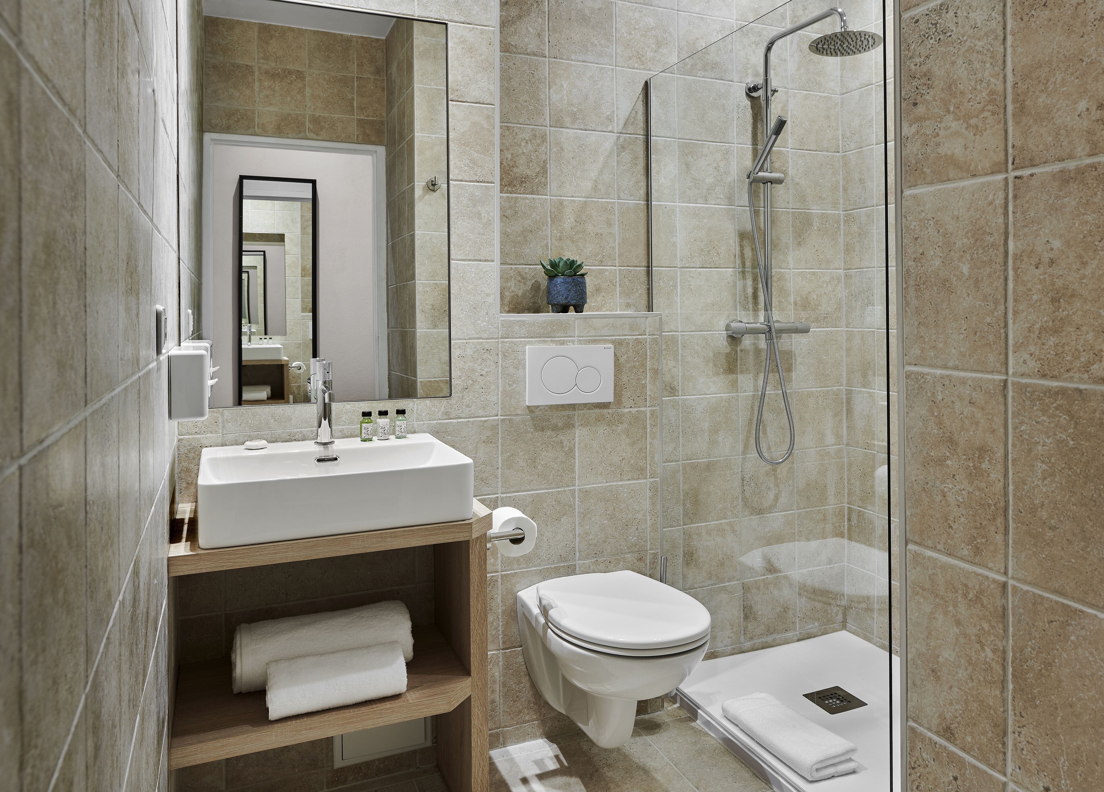 shower, free toiletries, hair dryer, towels