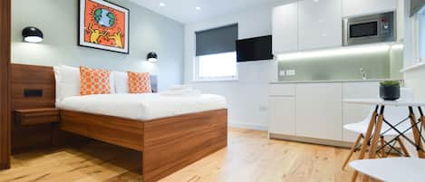 Deluxe Studio Apartment | Ropa de cama hipoalergénica y cortinas opacas