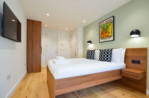 Standard Apartment | Hypo-allergenic bedding, blackout drapes, iron/ironing board, free WiFi - Shepherds Bush Green Serviced Apartments by Concept Apartments (London)