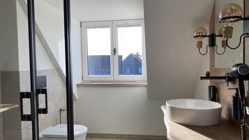 Verwalter Haus Apartment 1 & 2 | Bathroom | Shower, rainfall showerhead, hair dryer, towels