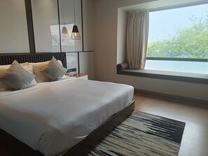 Egyptian cotton sheets, premium bedding, in-room safe, desk - Udman Greater Noida By Ferns N Petals (Greater Noida)