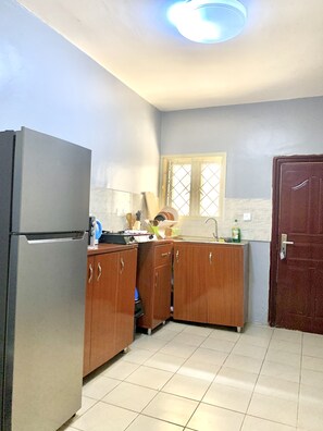 Fridge, microwave, electric kettle, toaster