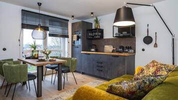 Turm Haus Apartment 4 | Living area | 43-inch LED TV with satellite channels, TV