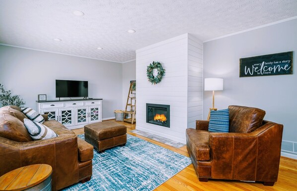 Smart TV, fireplace, books