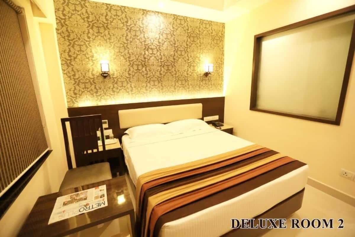 Deluxe Double Room | Blackout drapes, iron/ironing board, free WiFi