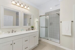 Combined shower/tub, hair dryer