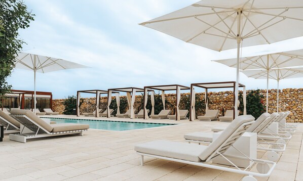 Seasonal outdoor pool, pool umbrellas, pool loungers