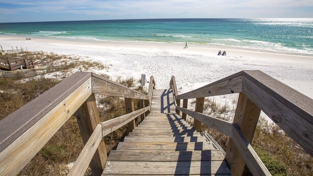 A wooden staircase leading to a beach with a clear view of the ocean. - Grand Isle 302 - Community Pool, Private Beach Access, 30A, Near Seaside! (Seagrove Beach)