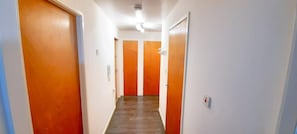 Guest rooms lead from this corridor, each with its own entrance.