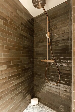 Bathtub, hair dryer, towels, soap