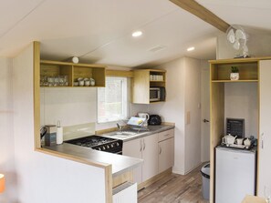 Fridge, microwave, high chair, cookware/dishes/utensils