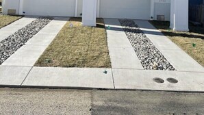 A two-story residential building with a balcony on the upper floor, a garage on the ground floor, and a clear sky. - Luxury Newer construction -5BR 3.5 bath  2nd floor (Ocean City)