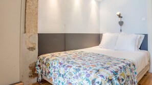 2 dormitorios, tabla de planchar con plancha, wifi gratis y ropa de cama