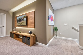 Deluxe Townhome, 4 Bedrooms, Private Pool | Living room | 40-inch Smart TV with cable channels, TV at Formosa Valley Resort by UNE Homes