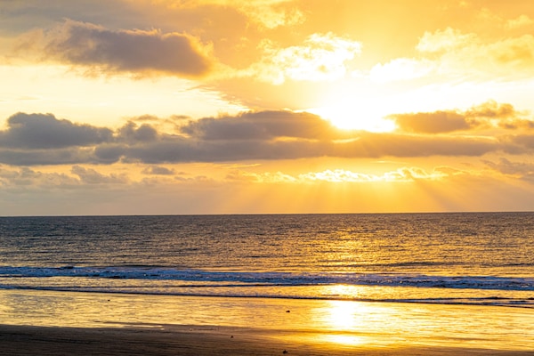 On the beach, sun loungers, beach umbrellas, beach towels