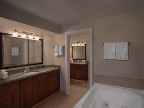 Bathtub, hair dryer, towels, soap