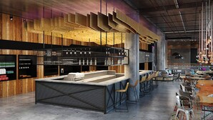 Um bar moderno com balcão central, painéis de madeira e diversas opções de assentos.
