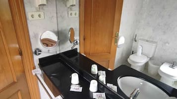 Hair dryer, bidet, towels, soap