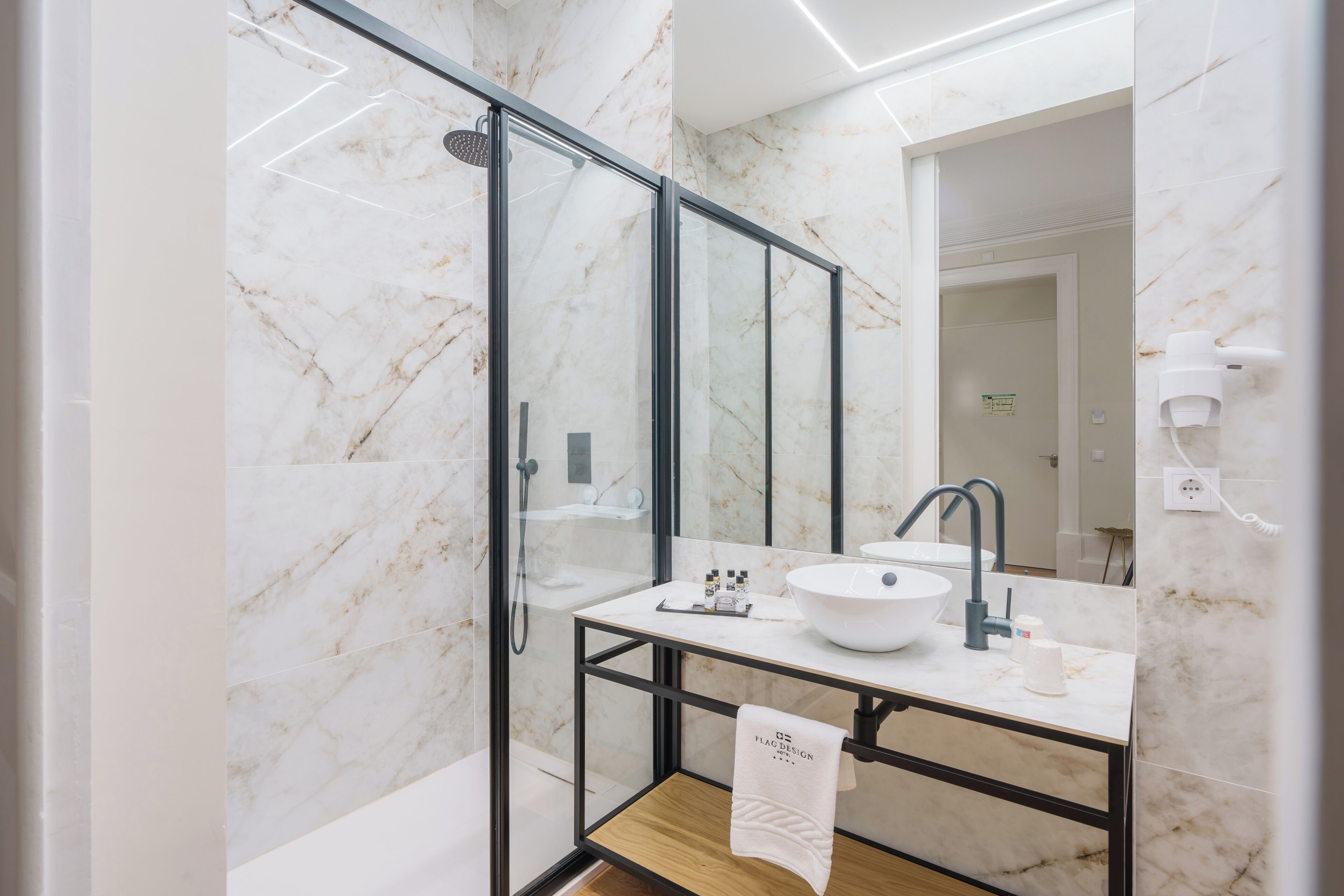 grand room | bathroom | hair dryer, towels