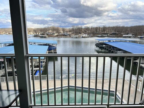 Lake Lodge Condo overlooking The swimming pool and the￼ Lake of the Ozarks