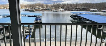 Lake Lodge Condo overlooking The swimming pool and the￼ Lake of the Ozarks