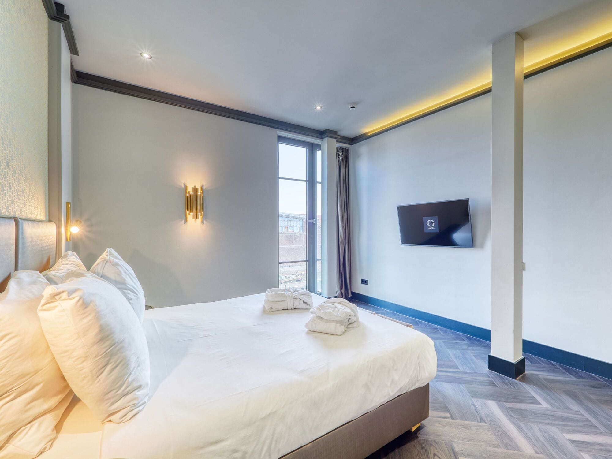 Foto - Triple G Hotels