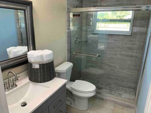Shower, hair dryer, towels, soap