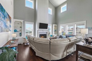 TV, fireplace, books, offices