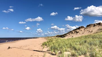 On the beach, white sand, beach towels