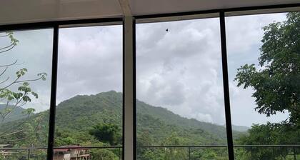 Eco Vibes, Bird Songs & Mountain Views — Book Your Stay in Minca!