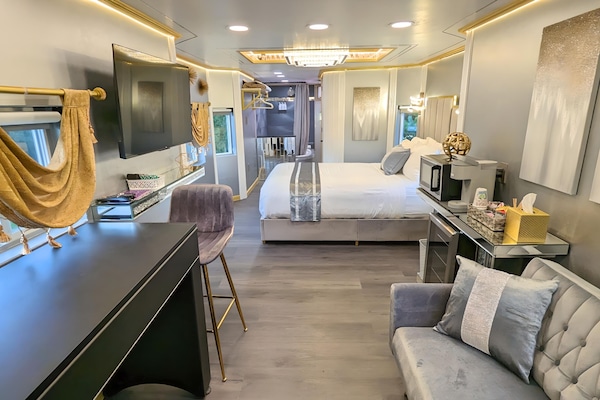 Elite Studio, 1 Queen Bed (Casino Royale - Private Caboose) | Living area | 32-inch TV with cable channels