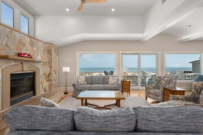 TV, fireplace - Take It to the Limit: 16 Bedrooms, oceanfront, pool, elevator, hot tubs, rec room, theater room! (Nags Head)