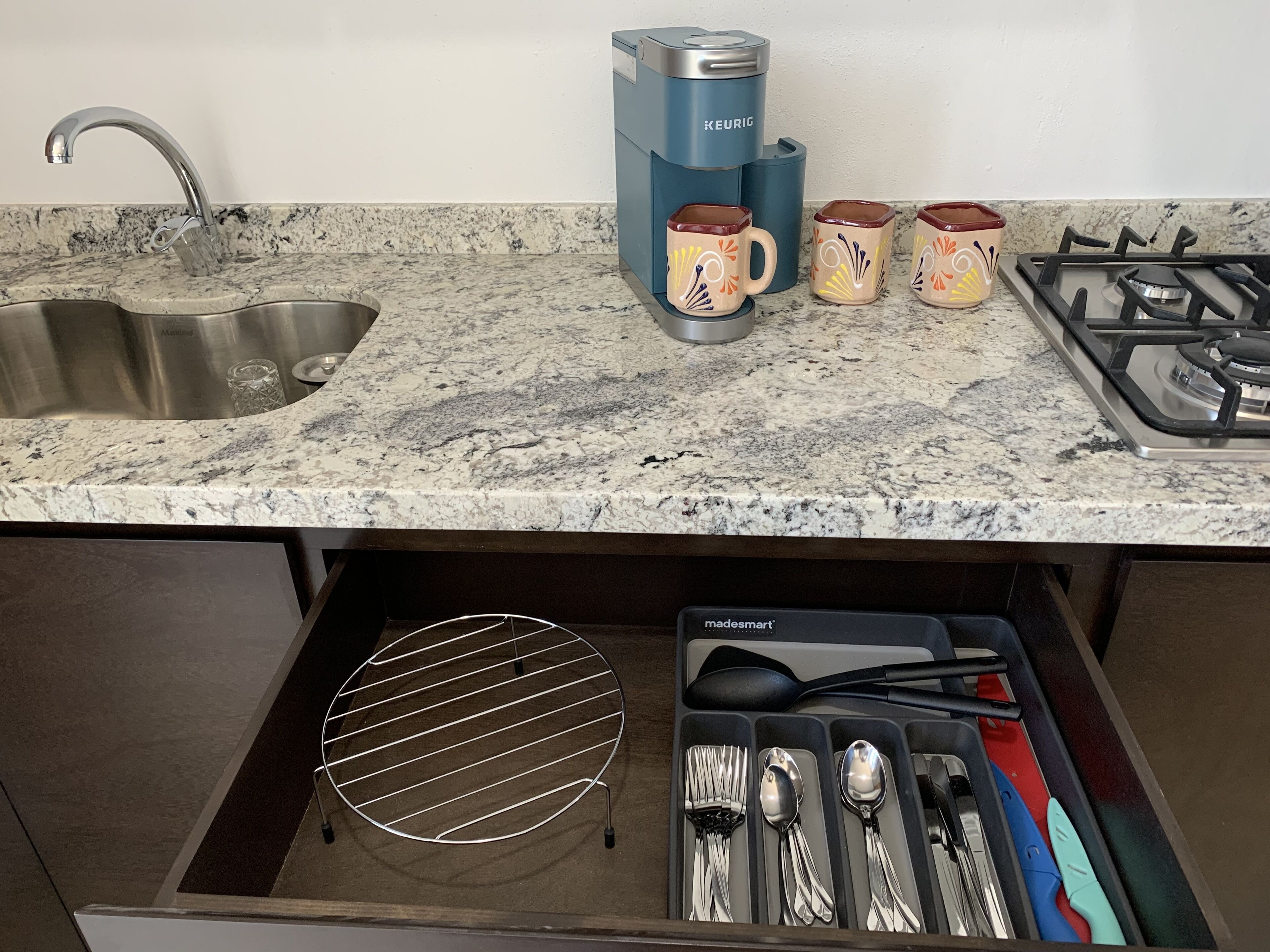 Fridge, microwave, stovetop, coffee/tea maker