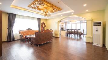 Penthouse, 3 Bedrooms, Balcony | Minibar, in-room safe, desk, laptop workspace