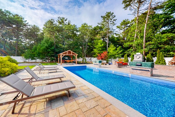 A heated pool - Modern home with dog-friendly yard, private pool/hot tub, pickleball & fast WiFi (Mashpee)