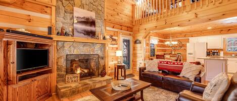 Televisio, takka, työhuone