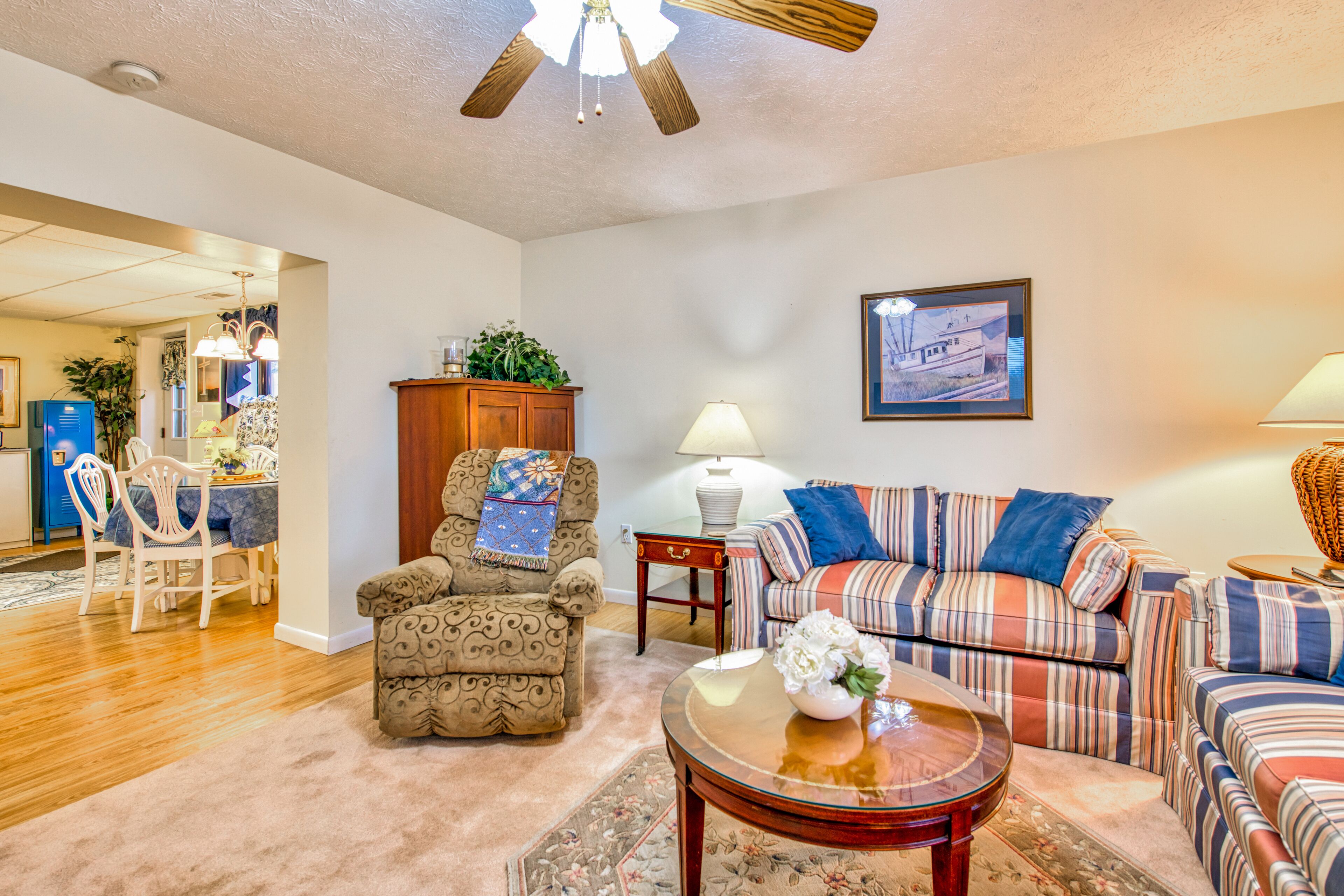 Lower-level lake retreat with mountain views, pool, central AC, deck, grill