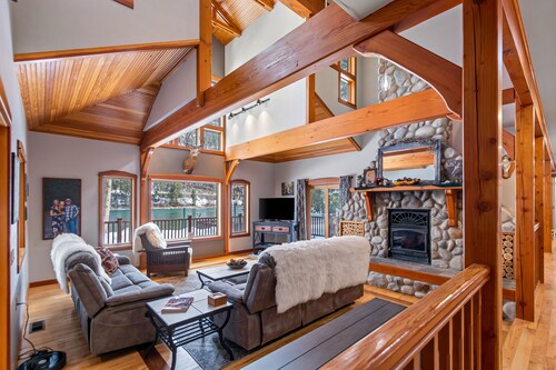 Expansive Riverfront Lodge with Dock, Game Room, Bar & Spacious Deck!