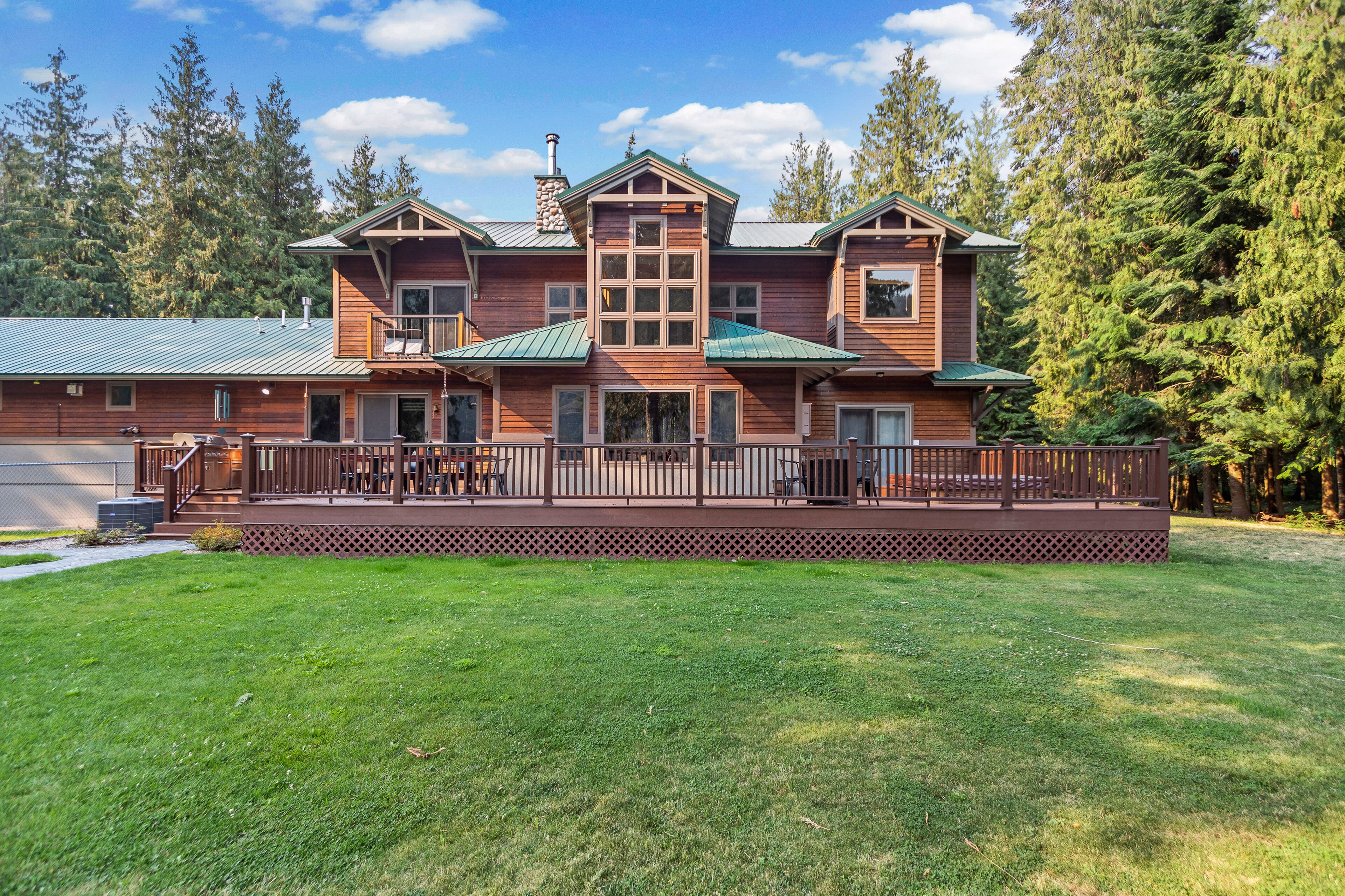 Expansive Riverfront Lodge with Dock, Game Room, Bar, & Spacious Deck