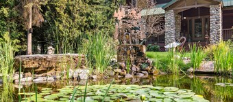 Expansive Riverfront Lodge with Dock, Game Room, Bar & Spacious Deck!