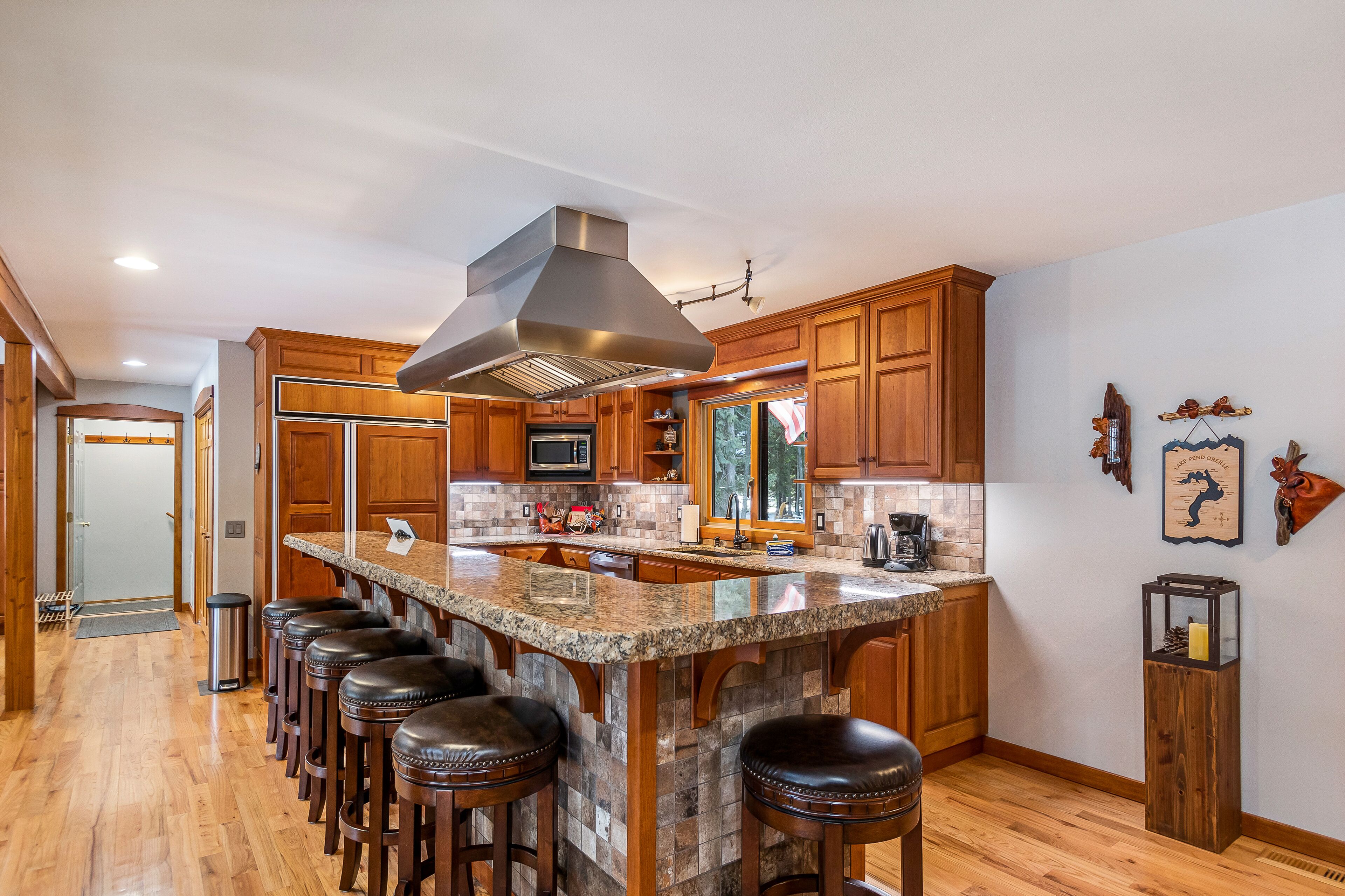 Expansive Riverfront Lodge with Dock, Game Room, Bar, & Spacious Deck