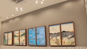 A wall with four framed artworks depicting various landscapes. - Toyoko Inn Fujisan Otsuki-eki (Otsuki)
