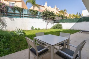 Outdoor dining - Holiday Home 'Ground floor Apartment NA' with Pool, Garden & Wi-Fi (Marbella)