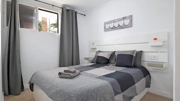 1 dormitorio, tabla de planchar con plancha, wifi gratis y ropa de cama