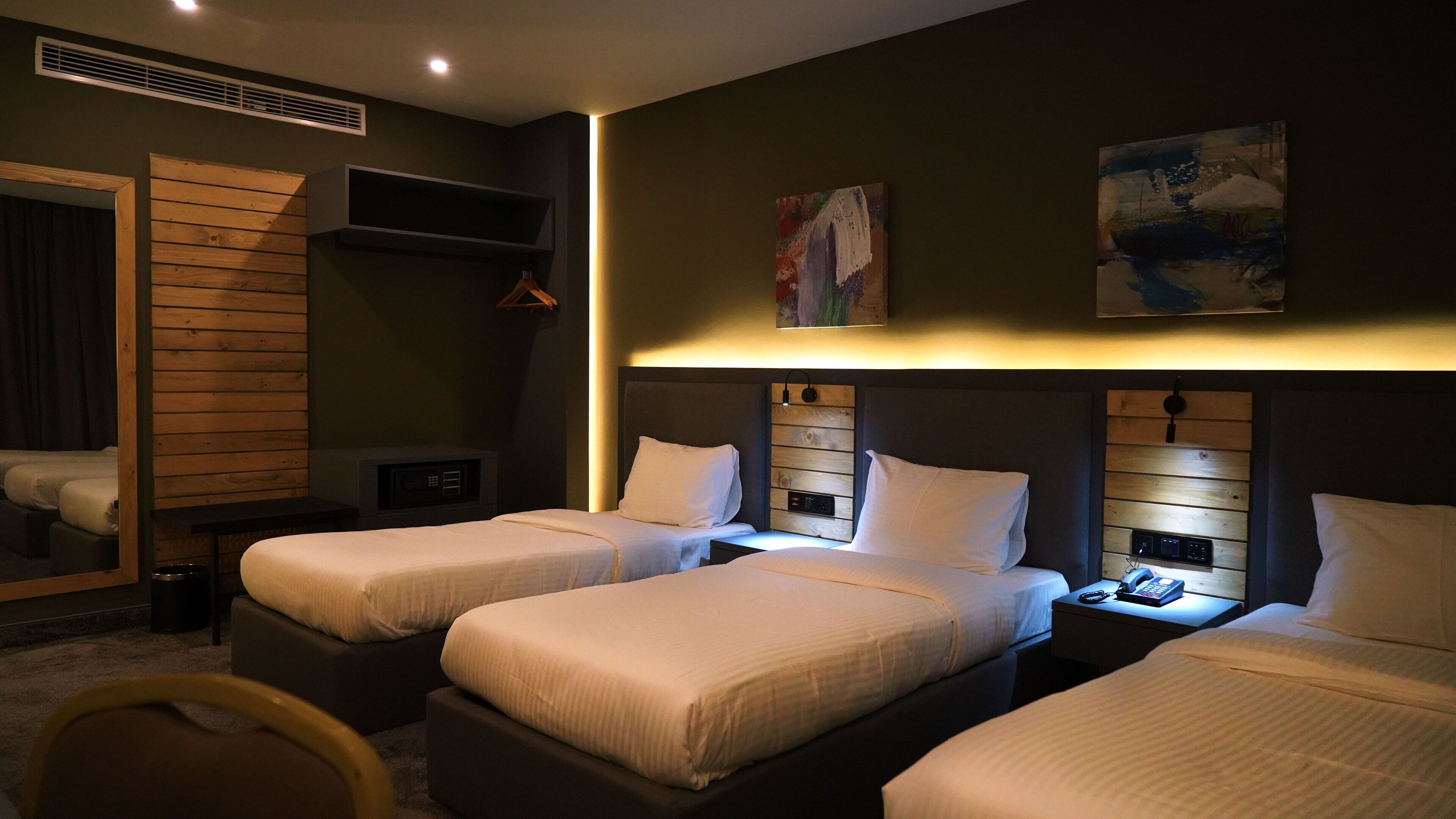 deluxe triple room | egyptian cotton sheets, premium bedding, down duvets, tempur-pedic beds