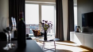 Living room - qpartments (Oldenburg)