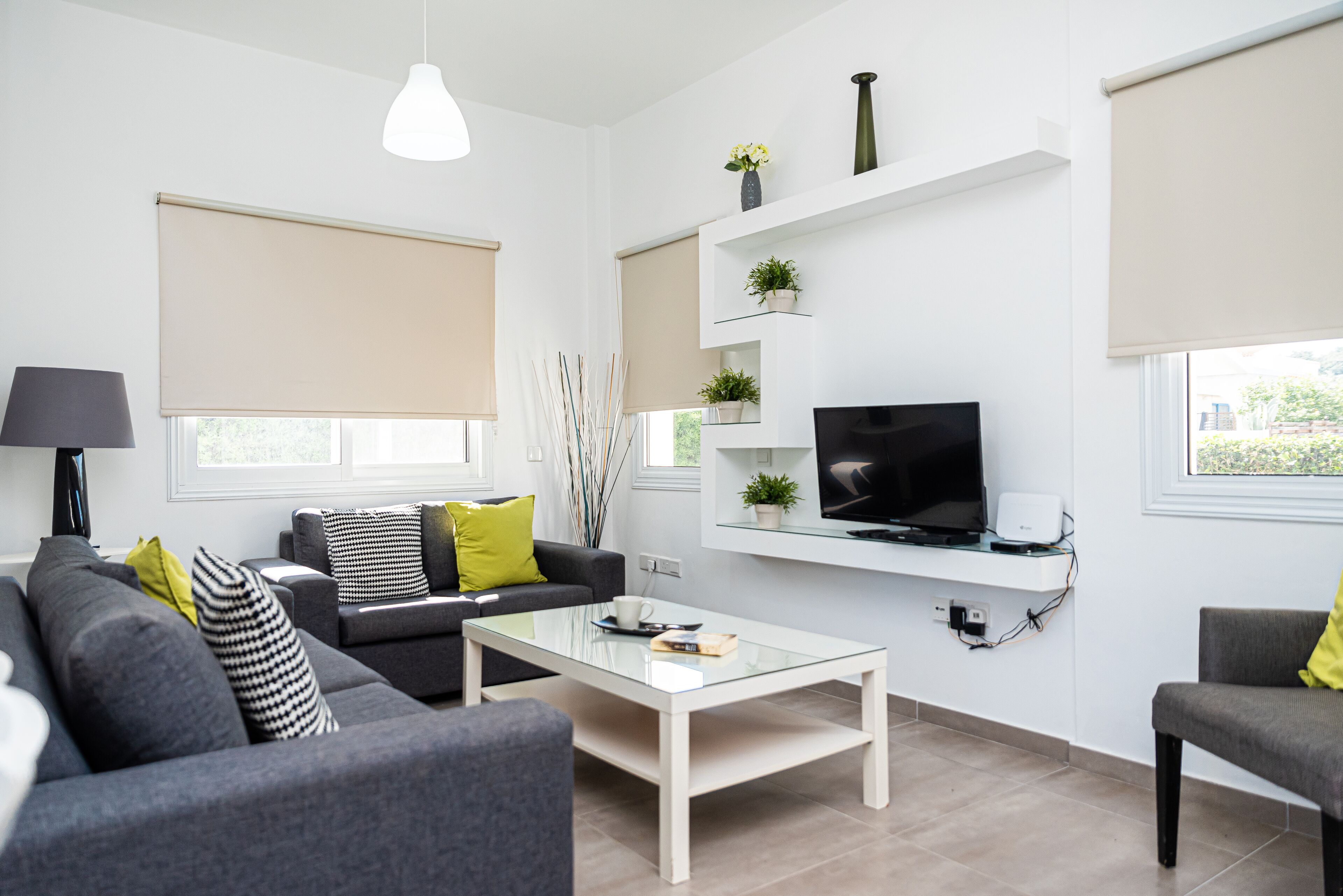 Luksusvilla (Camellia) | Oppholdsområde | En 32-tommers Flatskjerm-TV med kabel-kanaler samt TV