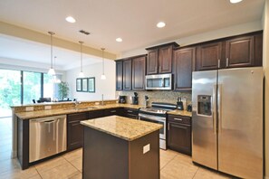 Townhome, 4 Bedrooms | Private kitchen | Cookware/dishes/utensils